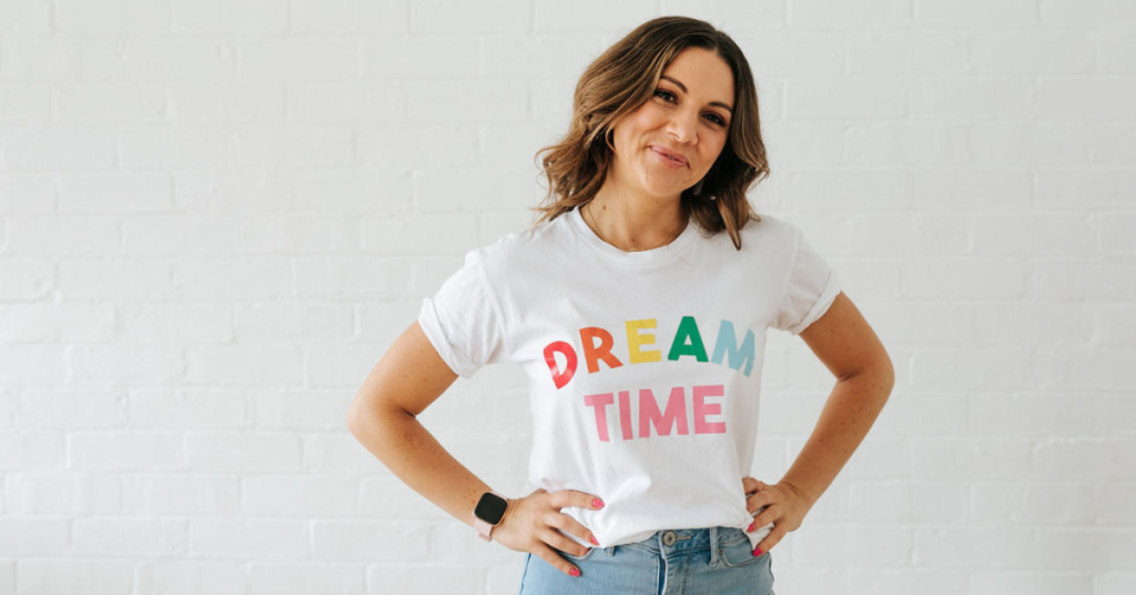 Woman wearing a t-shirt that says 'dream time'