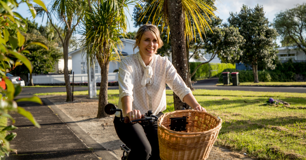 Green Business HQ founder riding a bike