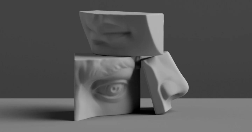 Statue of a face broken into three pieces