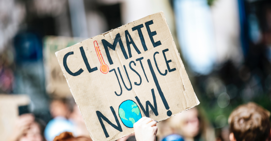 'Climate Justice Now!' protest sign
