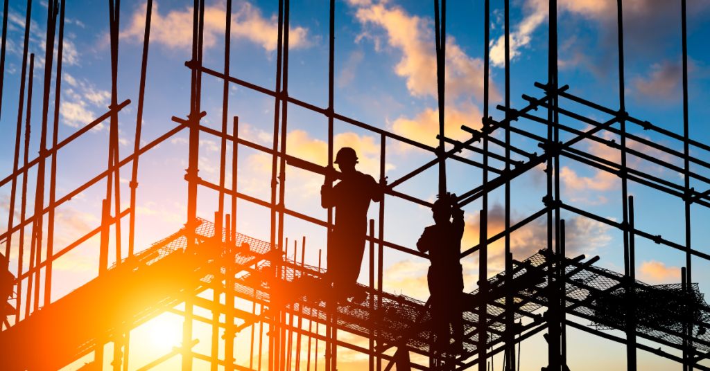 Construction workers on scaffolding