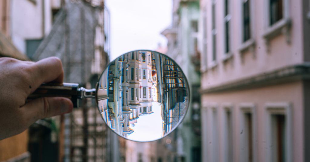 Looking through a magnifying glass at buildings