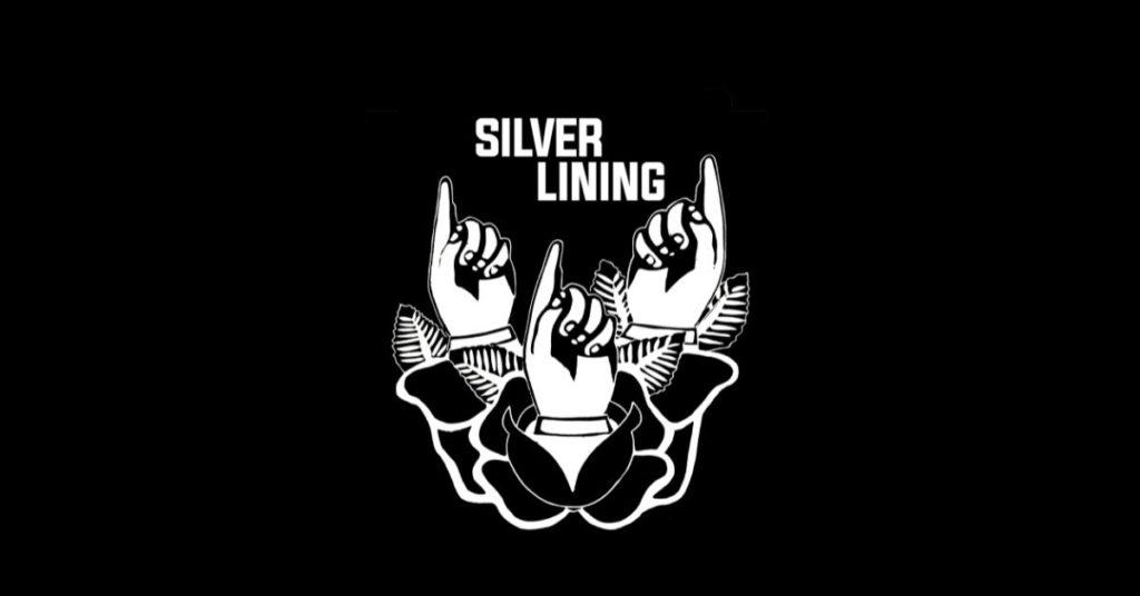 Silver Lining Agency Logo. Black background with white writing reading 'Silver Lining' Three hands pointing upwards