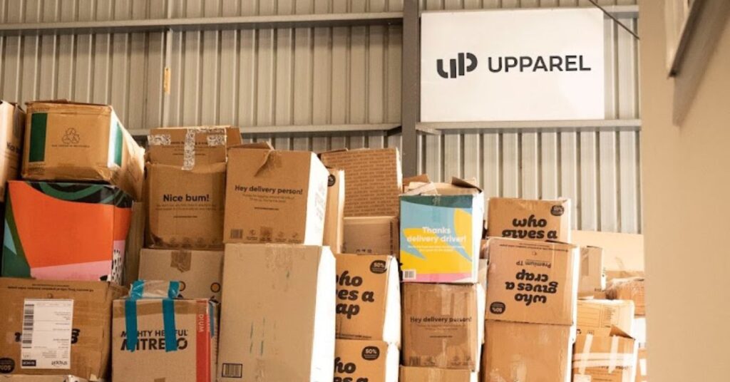 Lots of stacked boxes in the UPPAREL warehouse