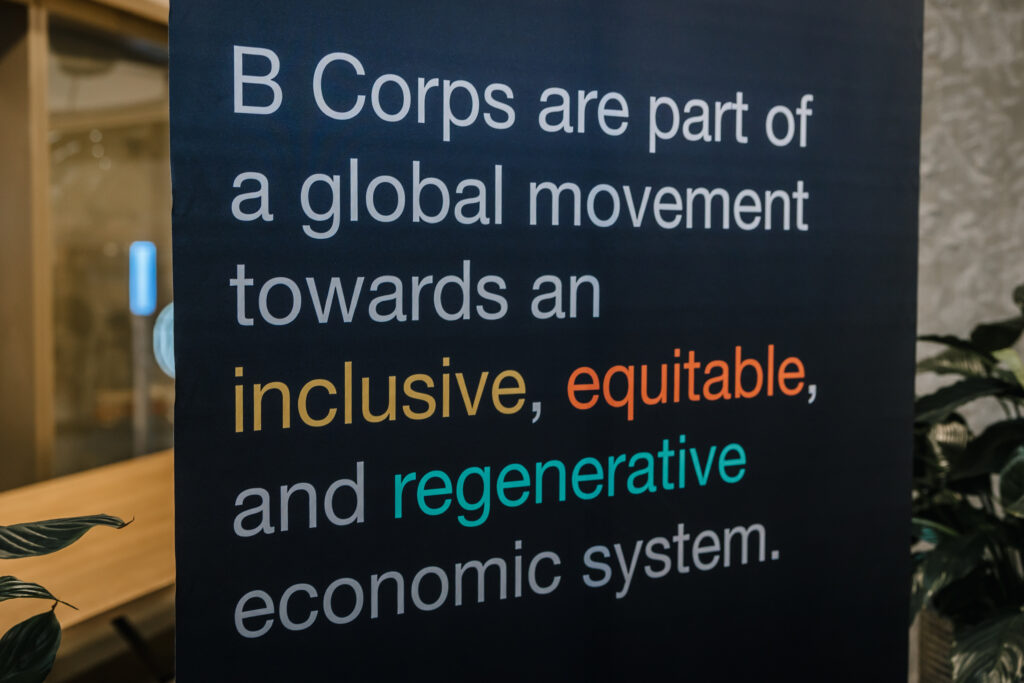 Signage - B Corps are part of a global movement towards an inclusive, equitable, and regenerative economic system.