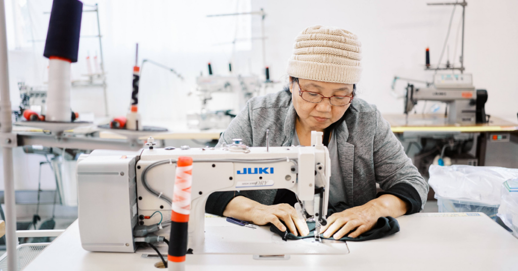 Person using a sewing machine