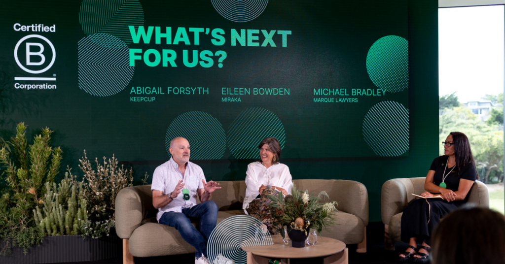 Michael, Abigail and Eileen on stage talking to crowd about 'What's next for us?'.