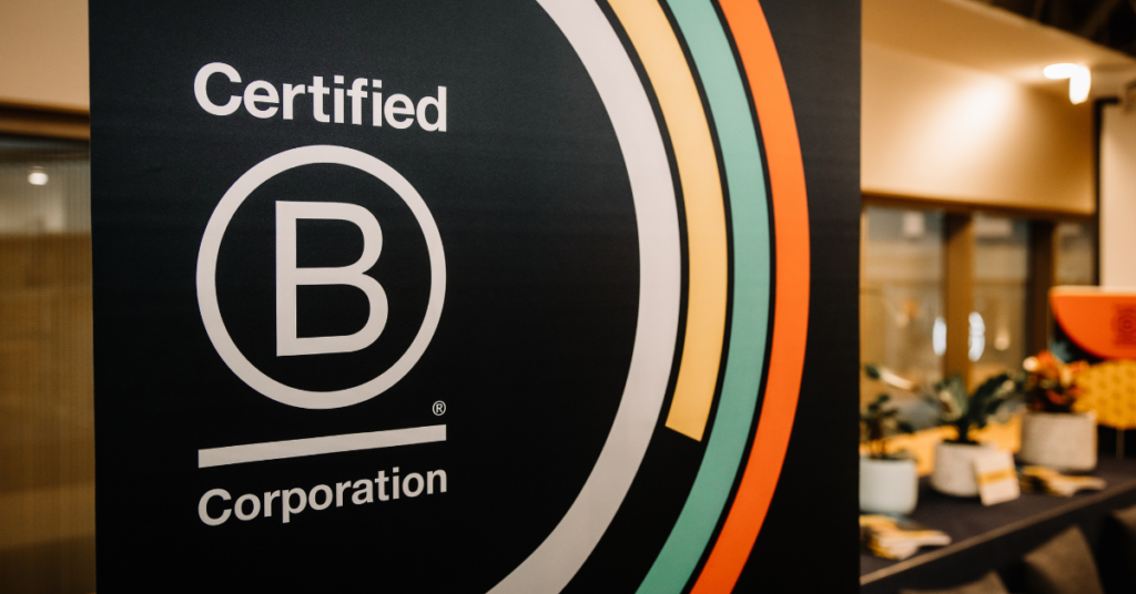 Certified B Corp logo on a pull up banner at an event