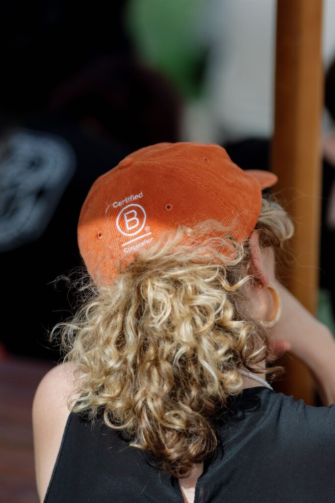 Hat with a B Corp logo on the back