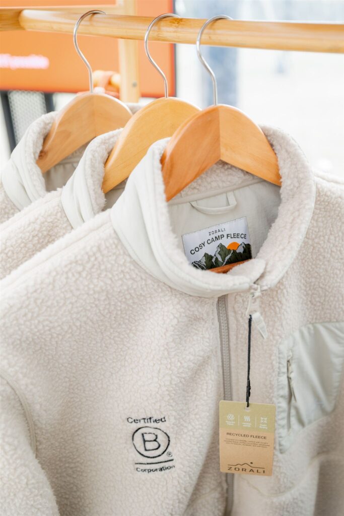 Fleece with a B Corp logo on it